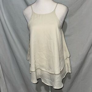 small cream Miami sleeveless crisscross back blouse